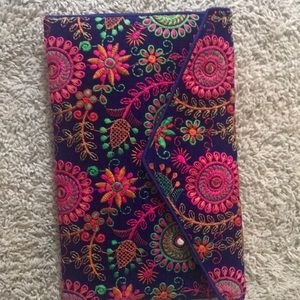 Hand embroidered clutches